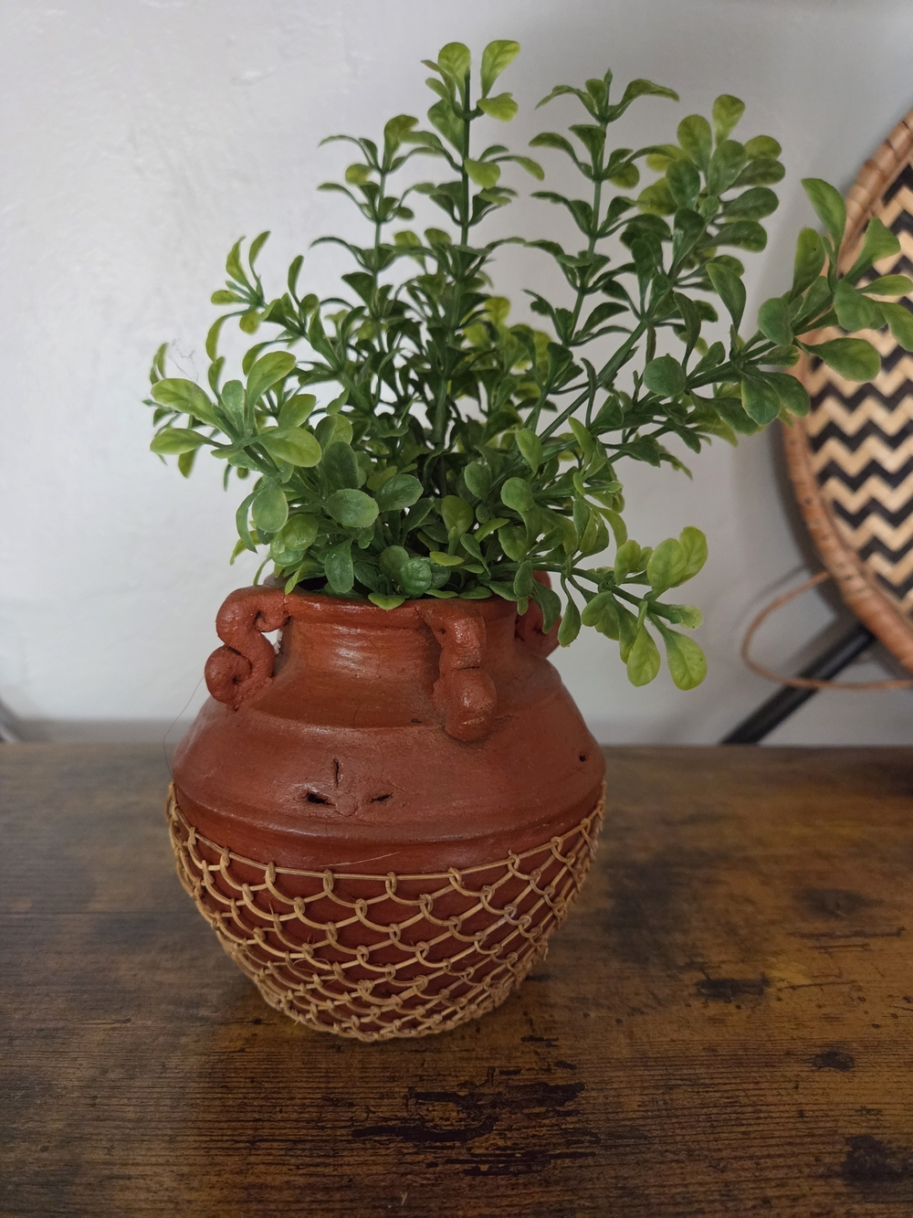 Terracotta pottery vase/planter with woven rattan detail